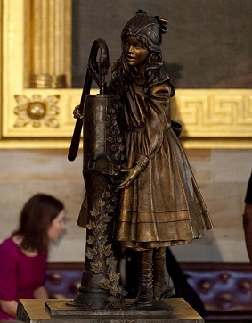 The Helen Keller statue depicts the moment when Anne Sullivan spelled "W-A-T-E-R" into the child's hand